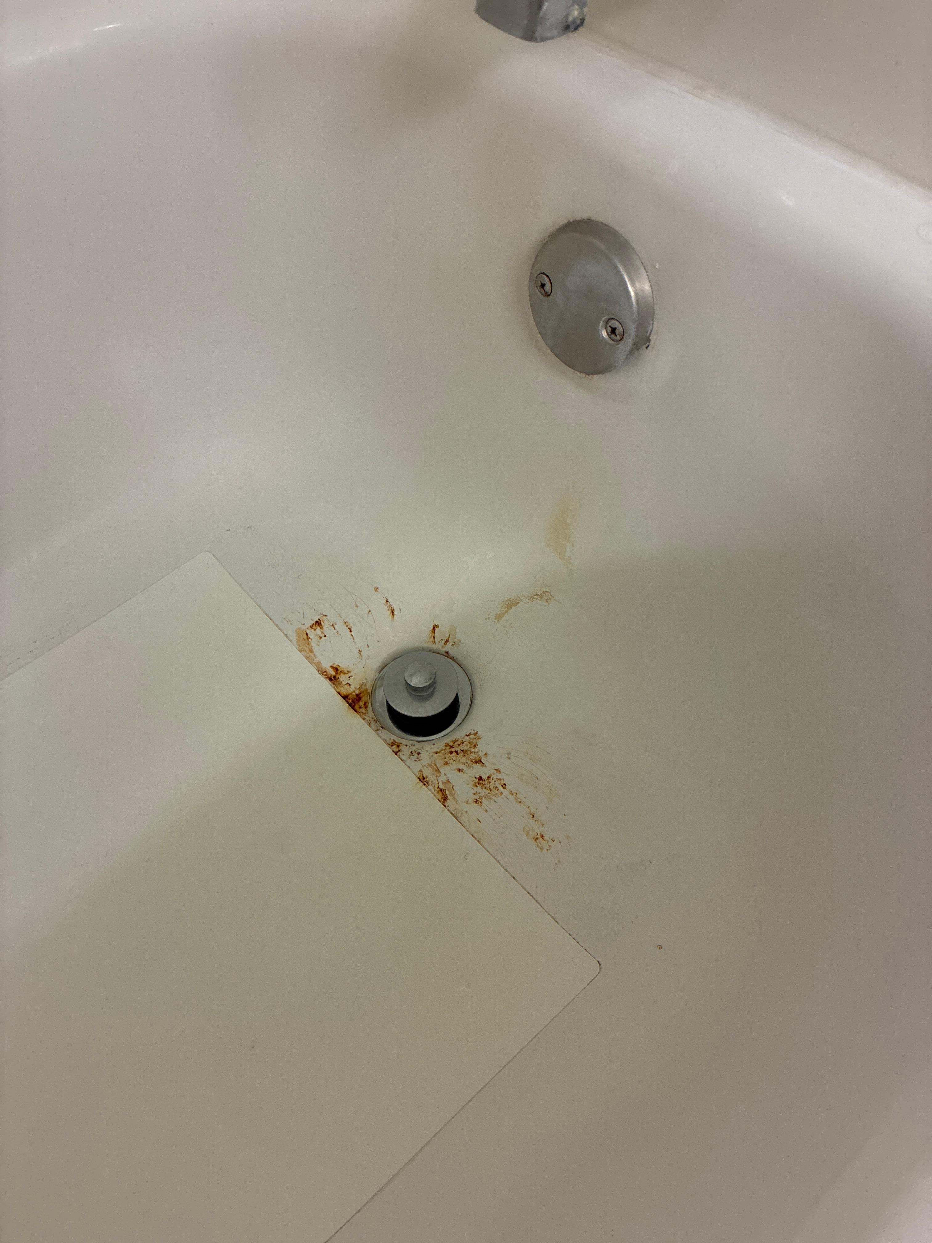 Filthy stained shower 