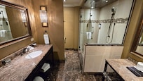 Room includes a beautiful shower with four sprays and jets