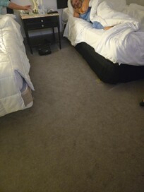One with a bed skirt and the other without one. They didn't even bother to put one on both beds.
