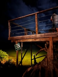 Overlook deck at night where ocean meets the river