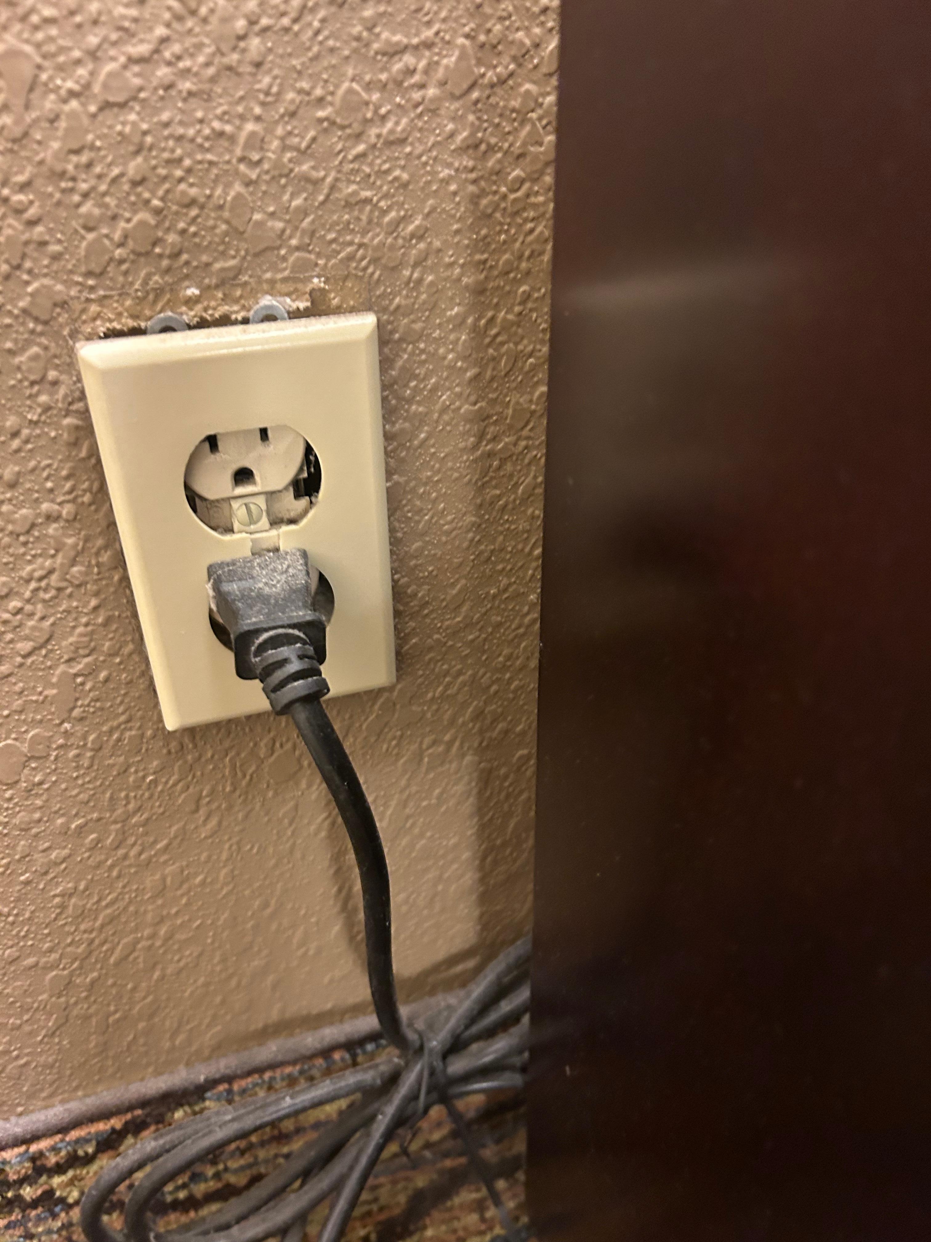 Damaged outlet hopefully there will not be any electrical fires