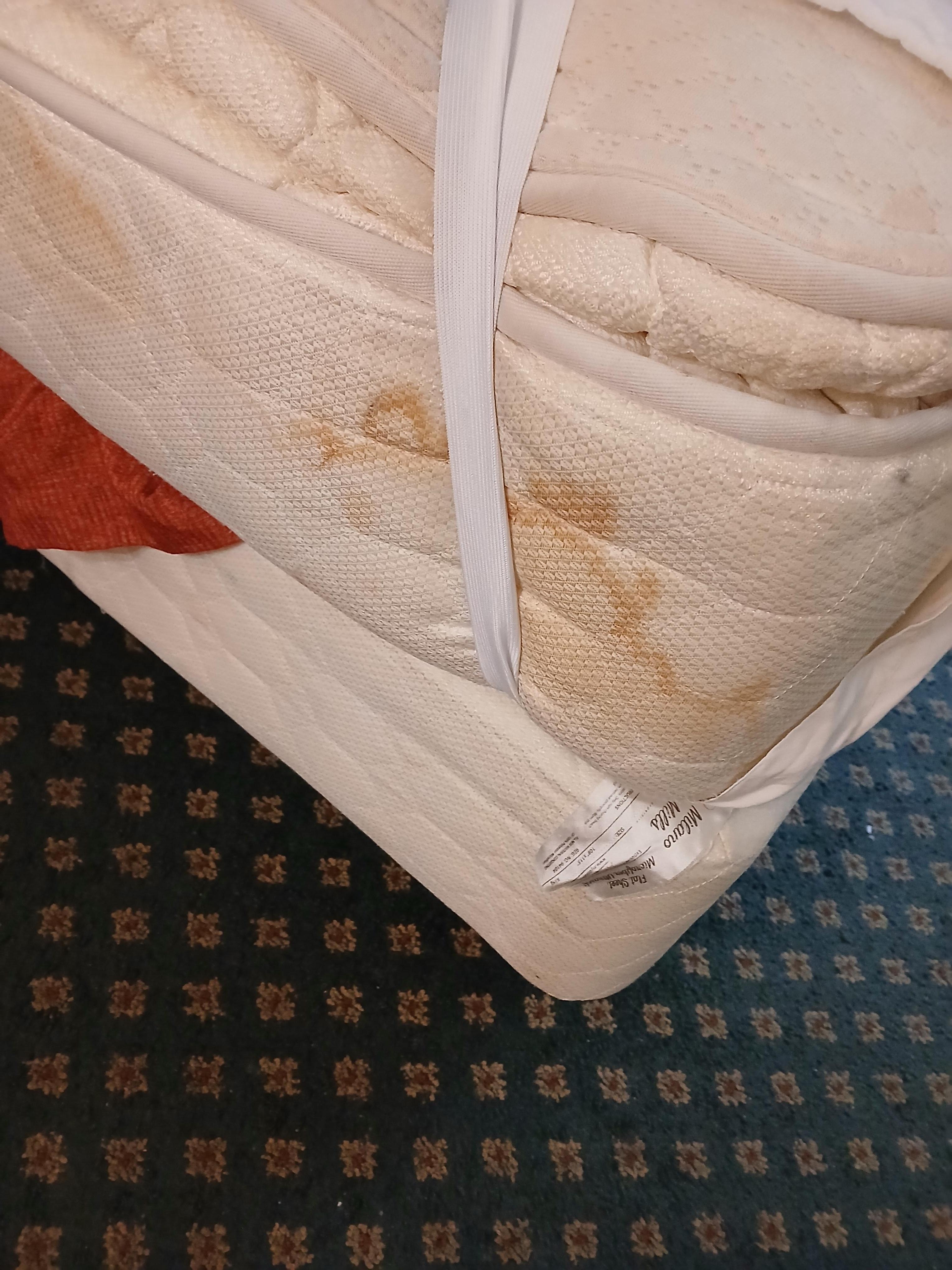 Stained mattress, sheets too short for mattress