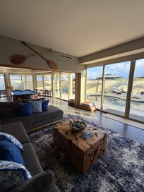 The living room and game room overlooking the pool.