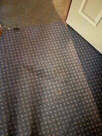 Stain on carpet and door doesn’t close