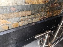 Filthy sink and back splash