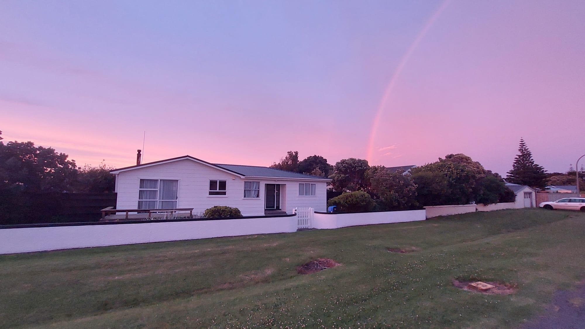 Morning rainbow over Dorset St, Opunake