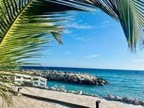 Beach area, little lagoon which is great for snorkeling