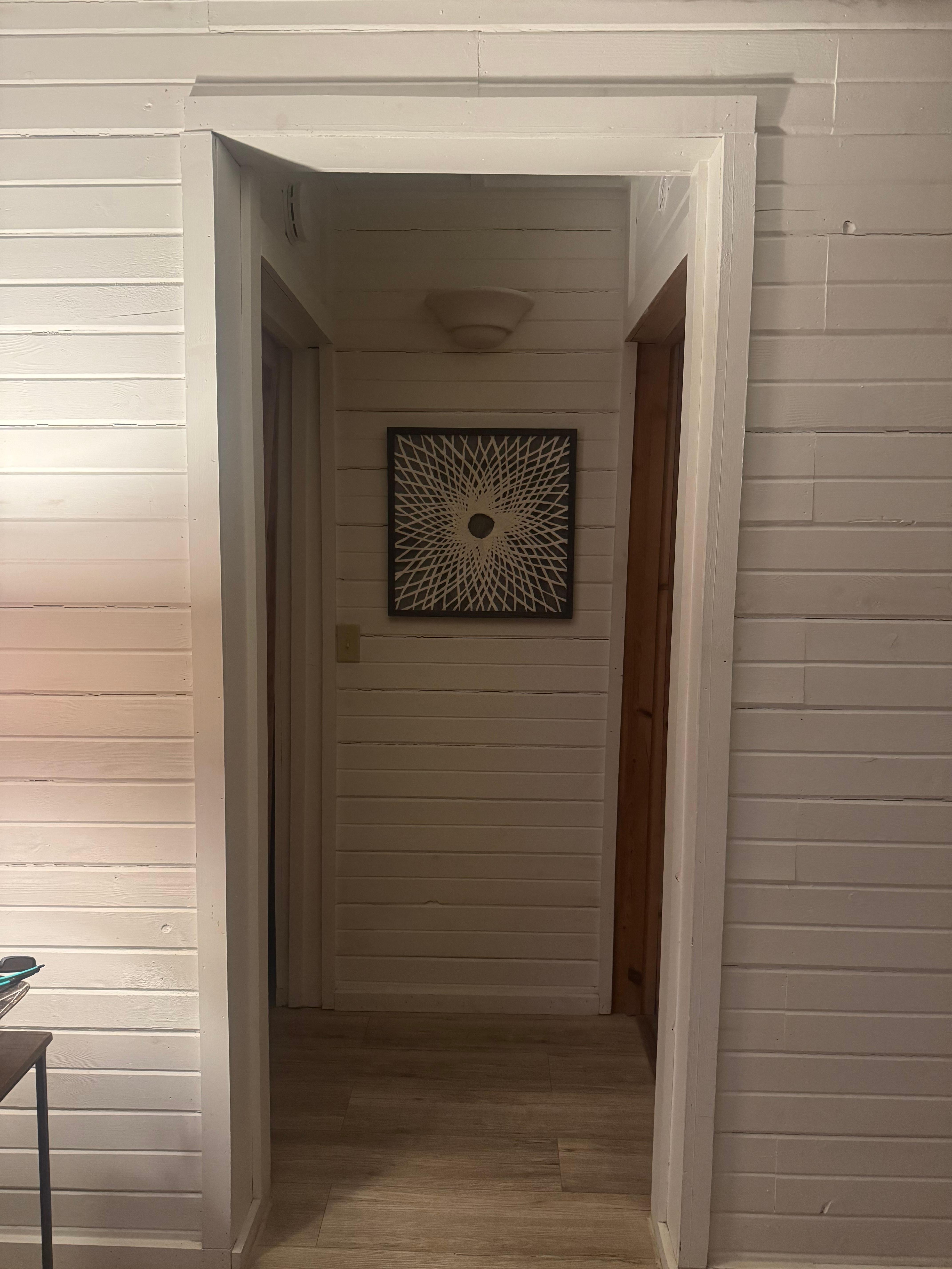 The simple cozy decor as you enter the cottage.  