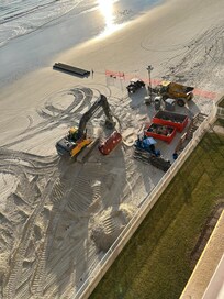Digging up the beach all day and all night