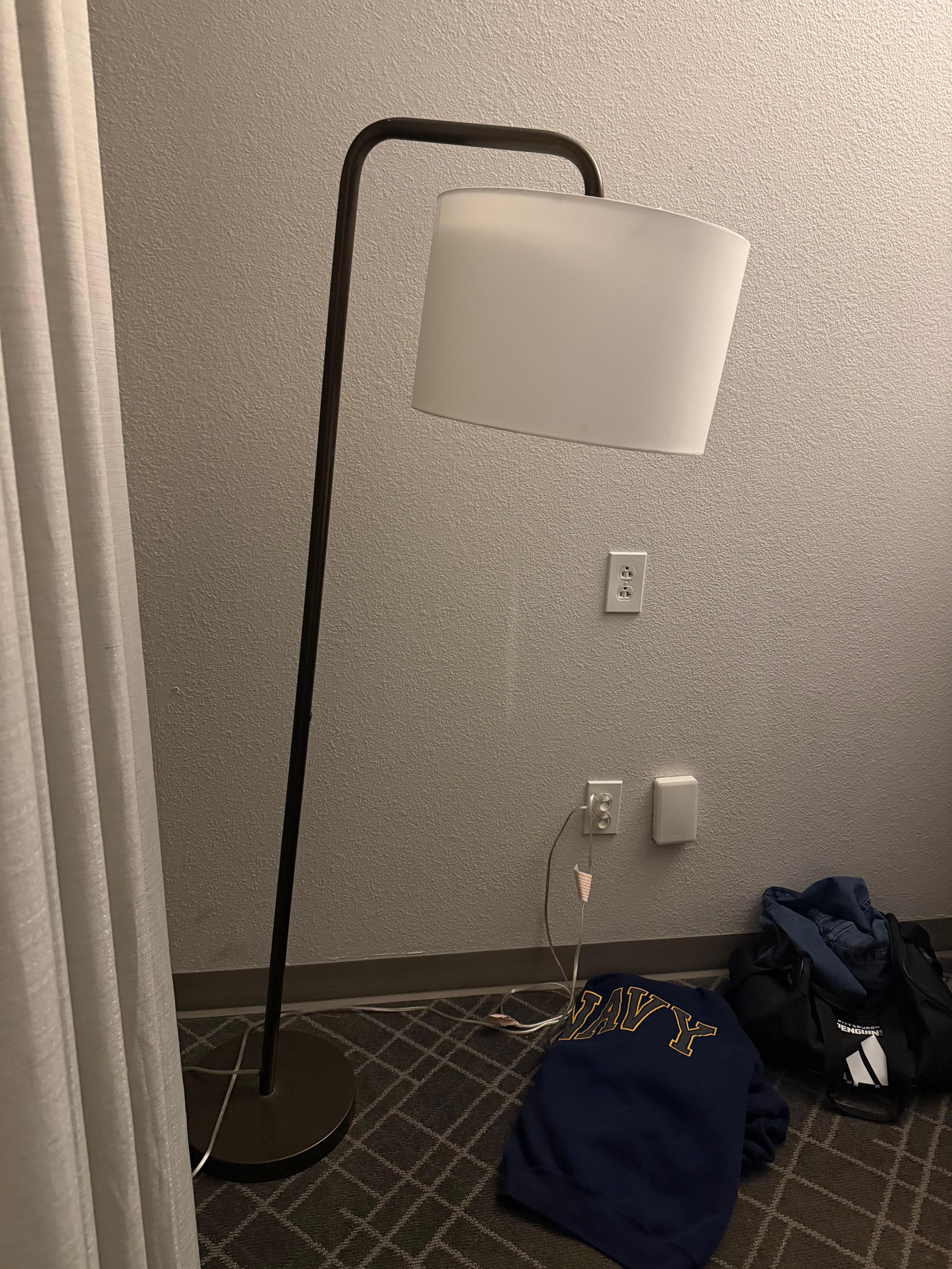 Half the lamps in the room were on their last legs it looked like a thrift store haul