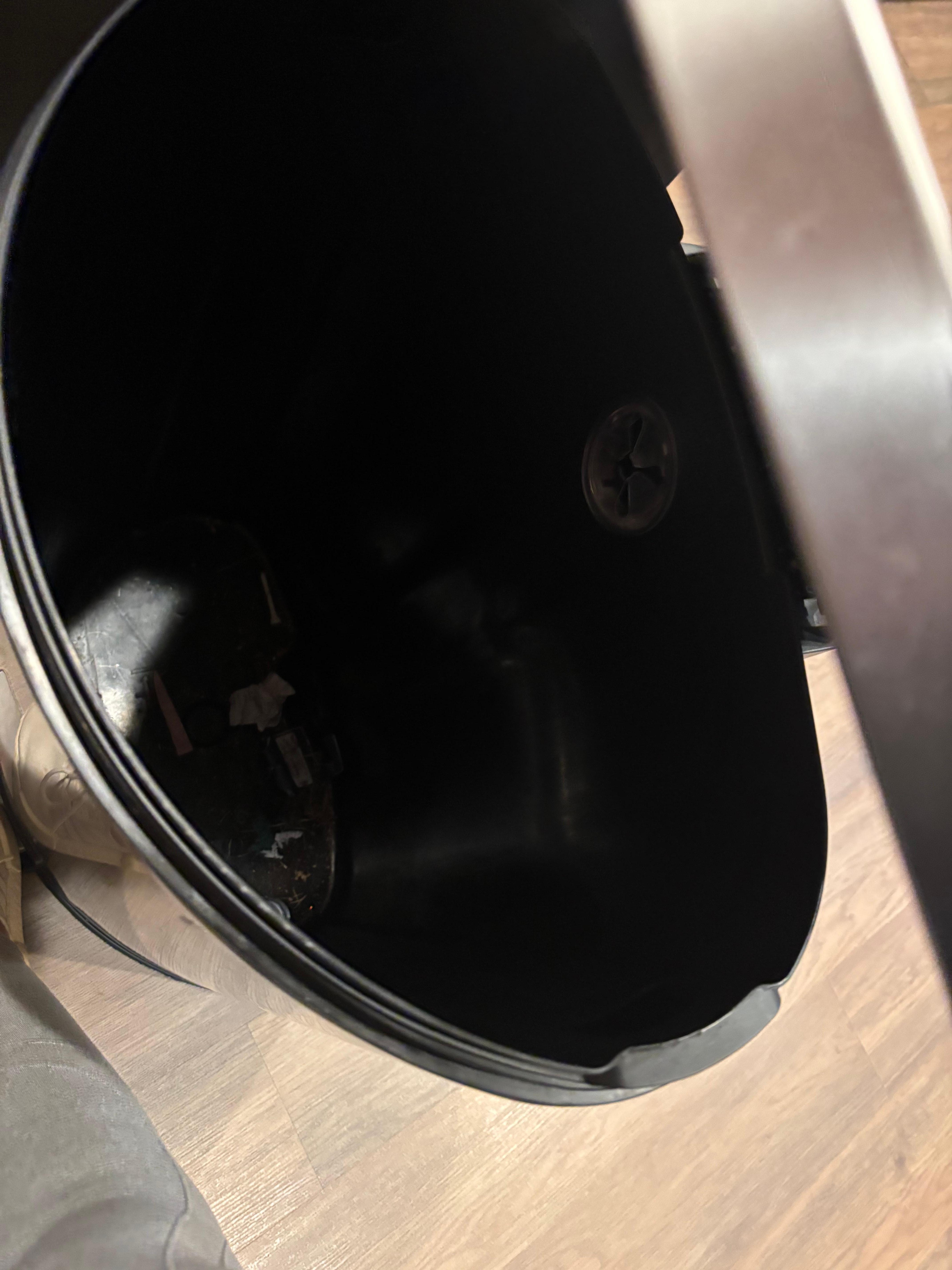 Trashcan with no bag and no where to be found 