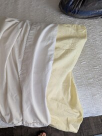 Pillow protector is yellow...very weird