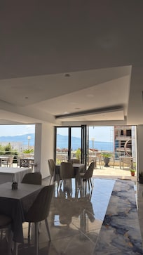 Open plan dining area which overlooks the sea