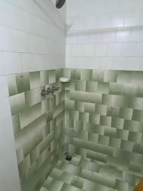 no water from the showerhead, just from the hole in the wall by your feet.