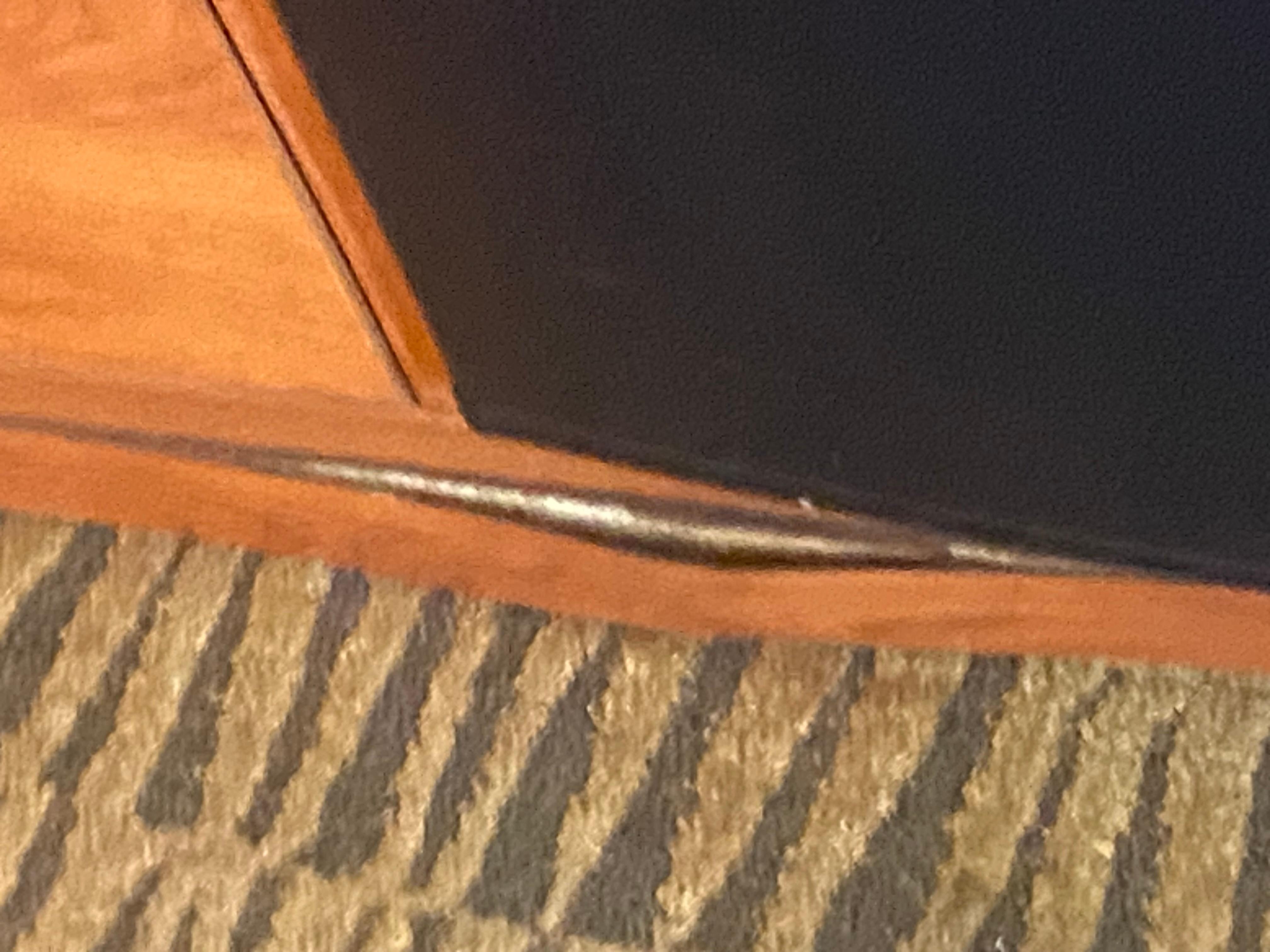 Bottom of dresser shows water damage