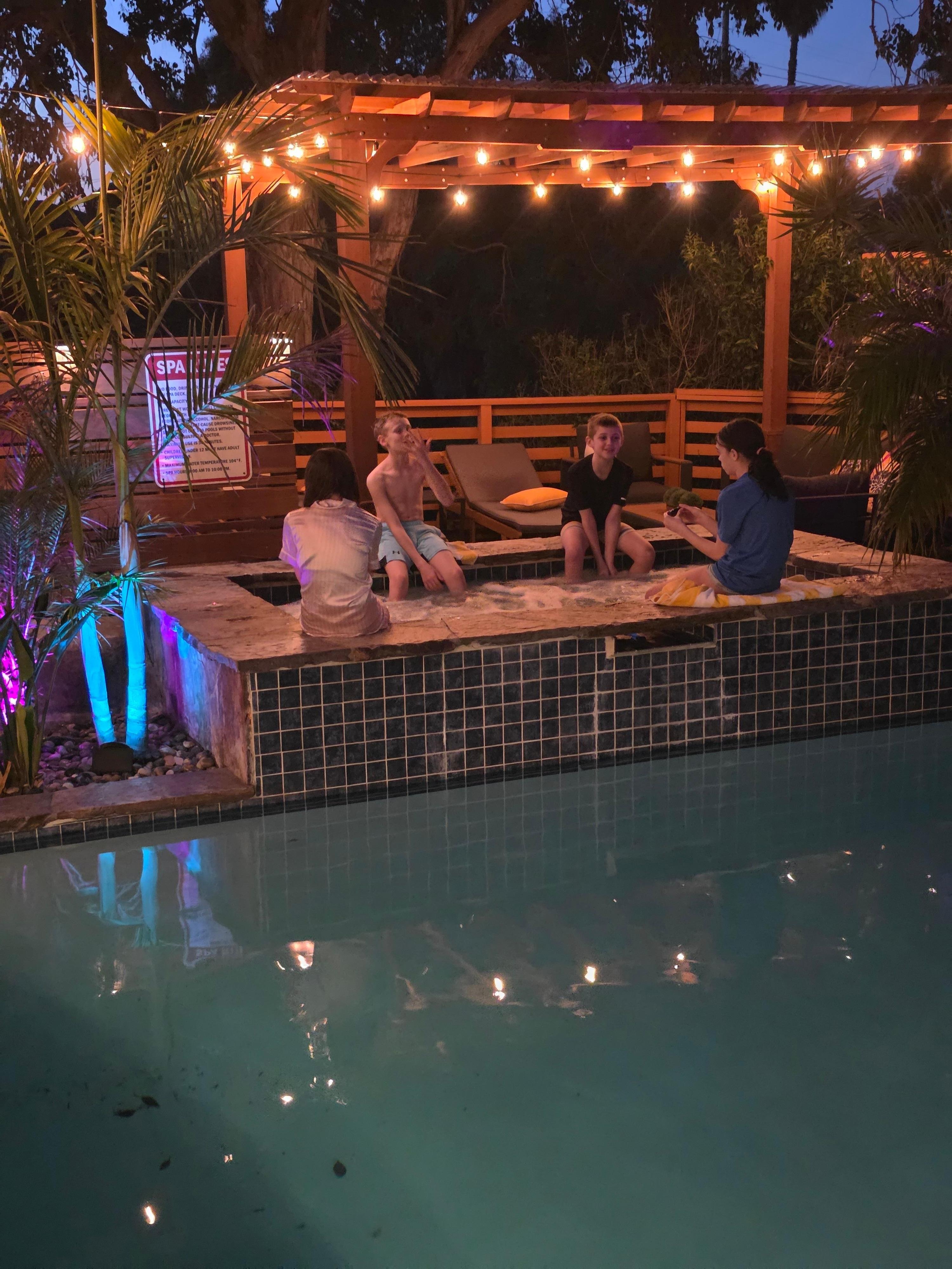 View of pool area at night