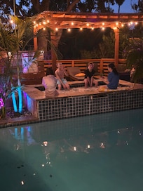View of pool area at night