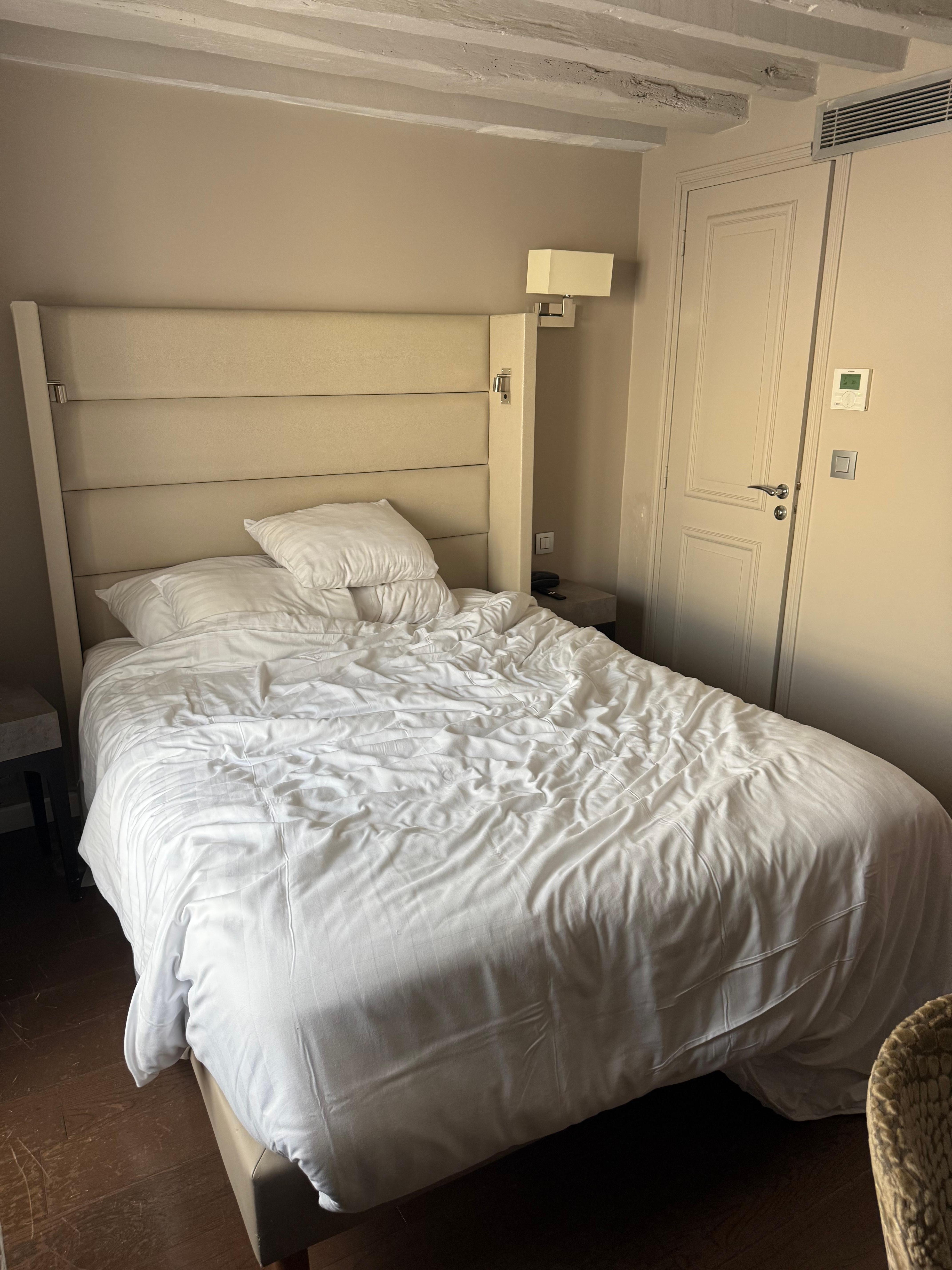 Head board on bed had brown and red stains