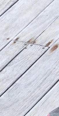 Rusty screws around decking