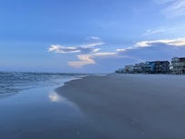 Down the beautiful beach by the house.