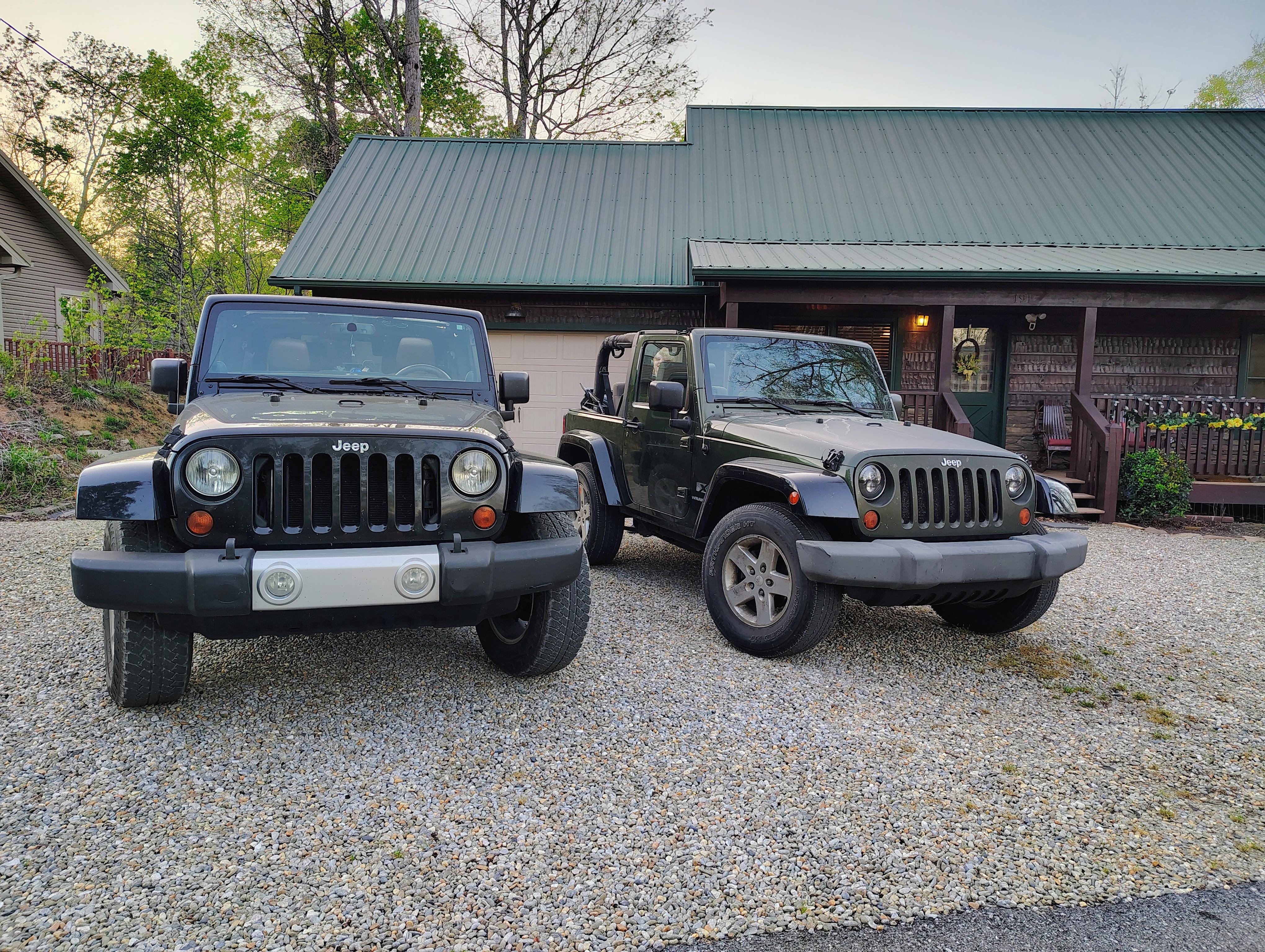 Jeeps and the front of the cabin