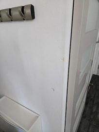 Damage done to the wall. Also needs fresh paint.