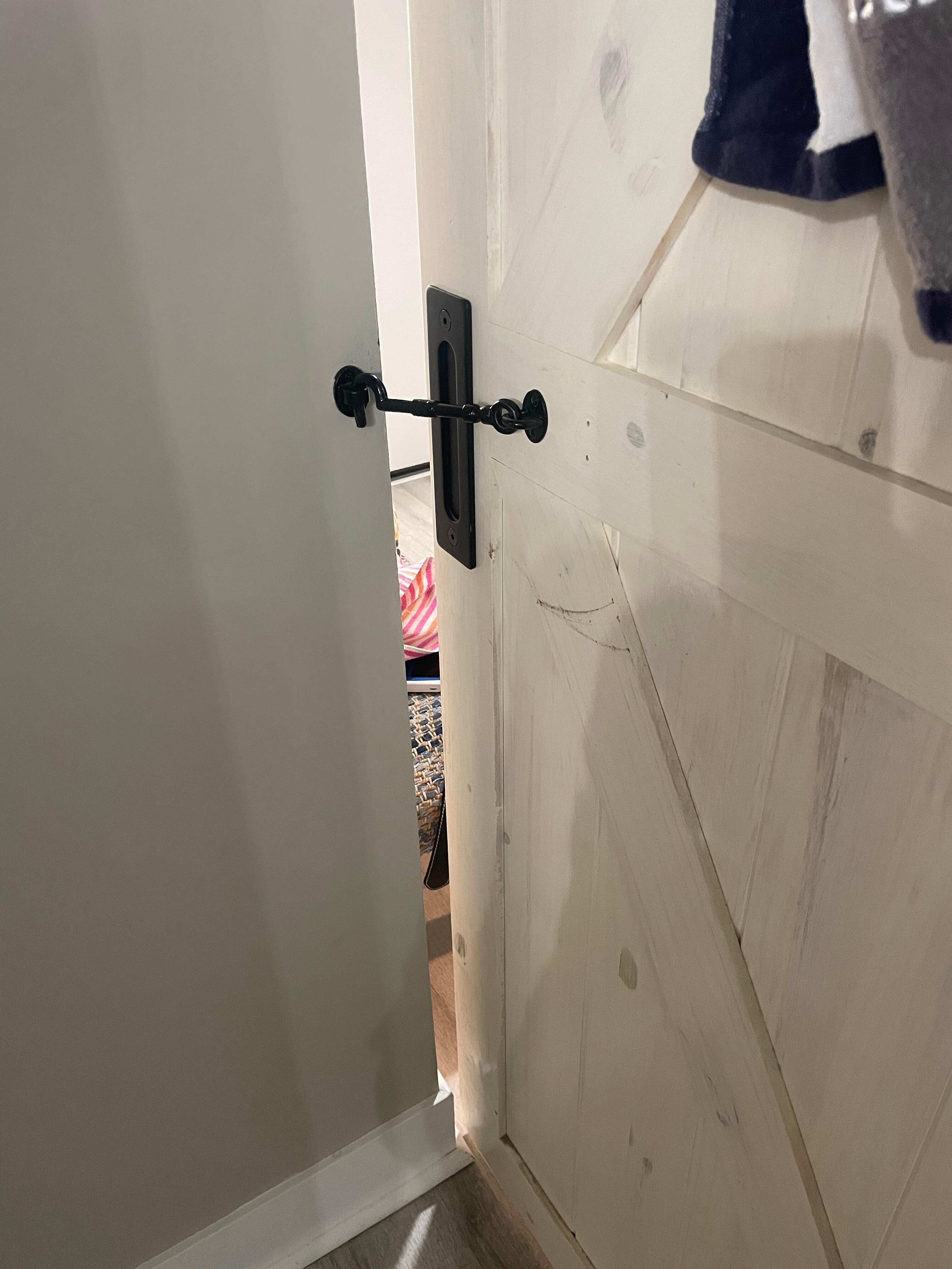 Huge gap on so-called door to hallway that joins bathroom to bedroom.