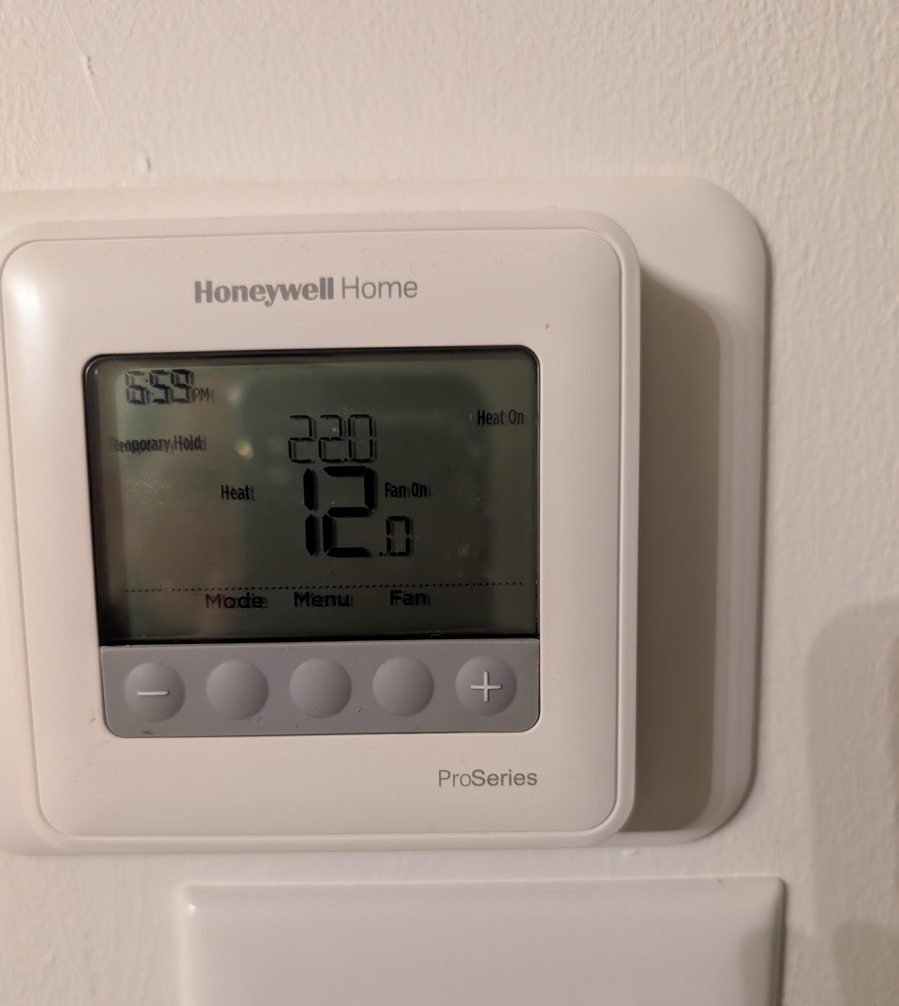 The thermostat after we turned the furnace on. 