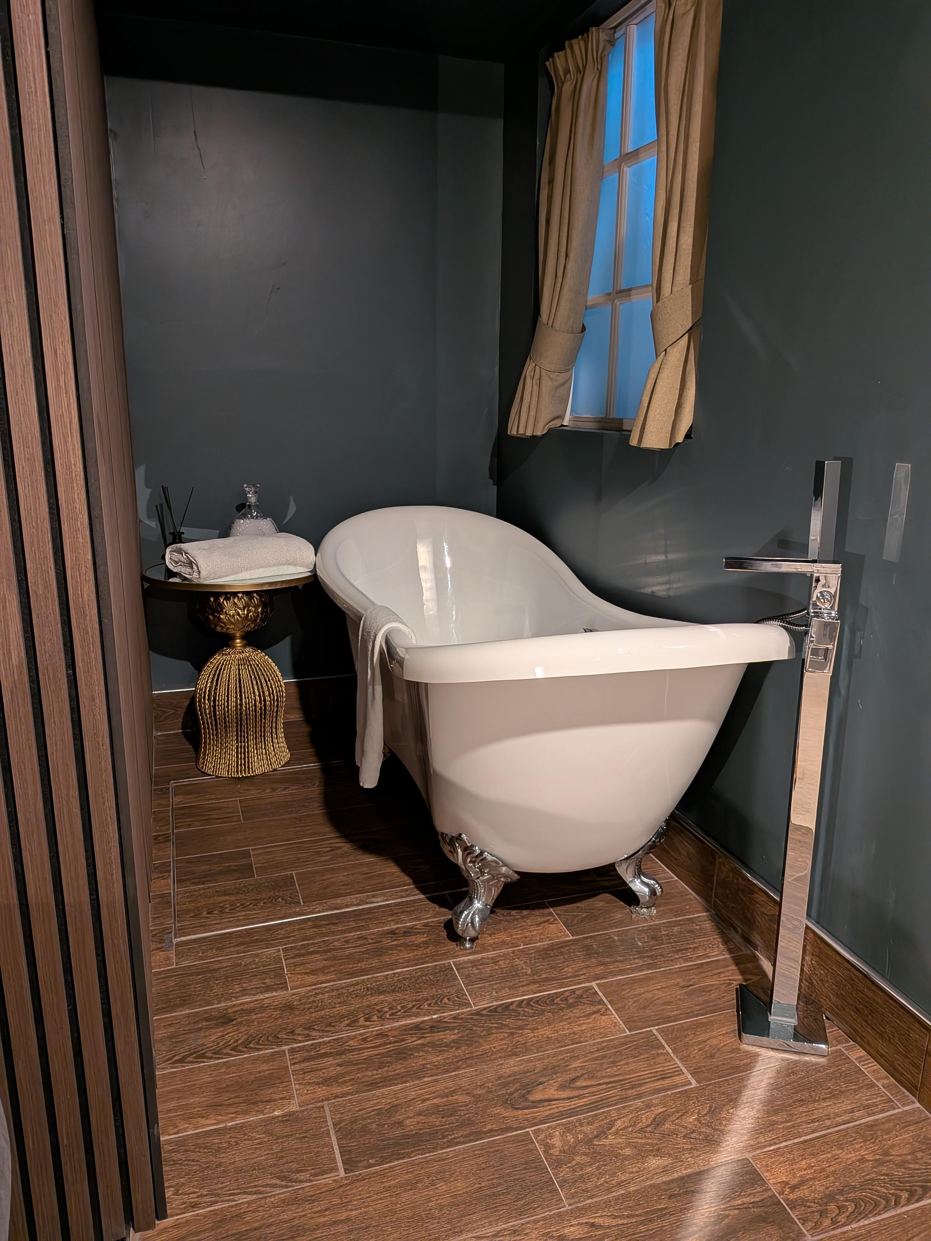 Freestanding bath in room