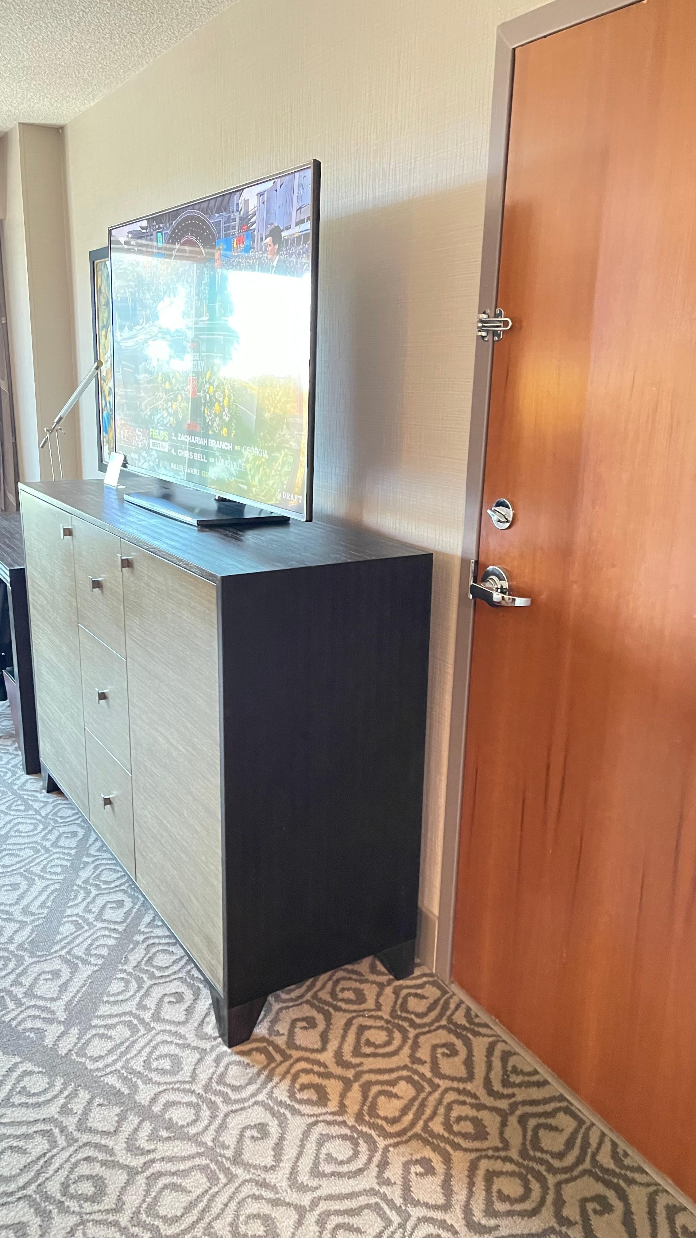 This is an adjoining room, hence the door. 