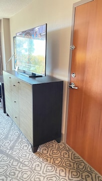 This is an adjoining room, hence the door.