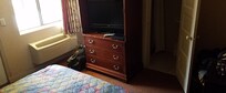 Entire room with bathroom in closet.