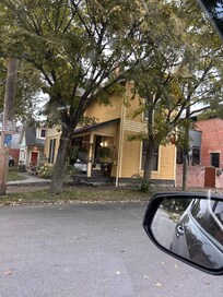 Parking under said tree in front of the neighbors house, got my newly detailed car -covered- in sticky sap. Parking during week is easier than weekend. However a parking garage is around the corner about a block down from where the place is.