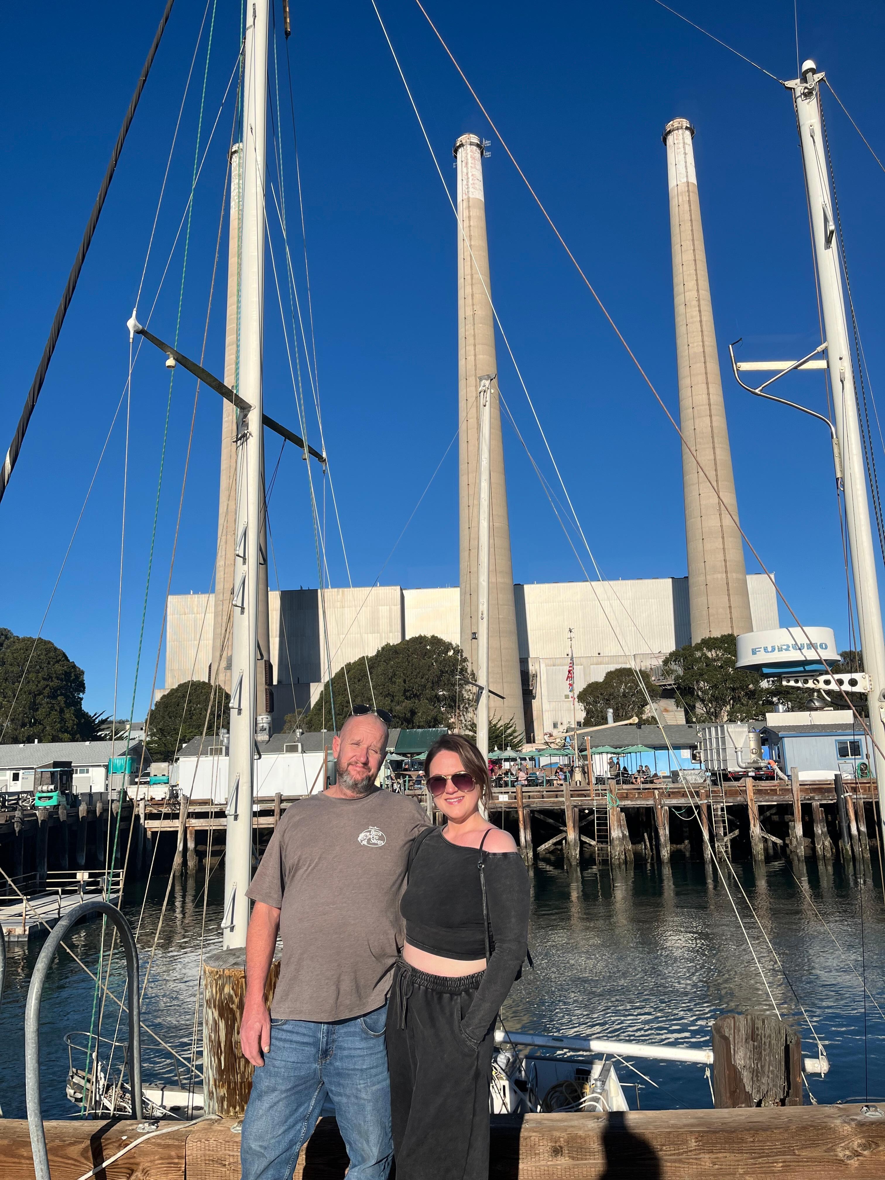 My Husband and I across from the Dockside Too.