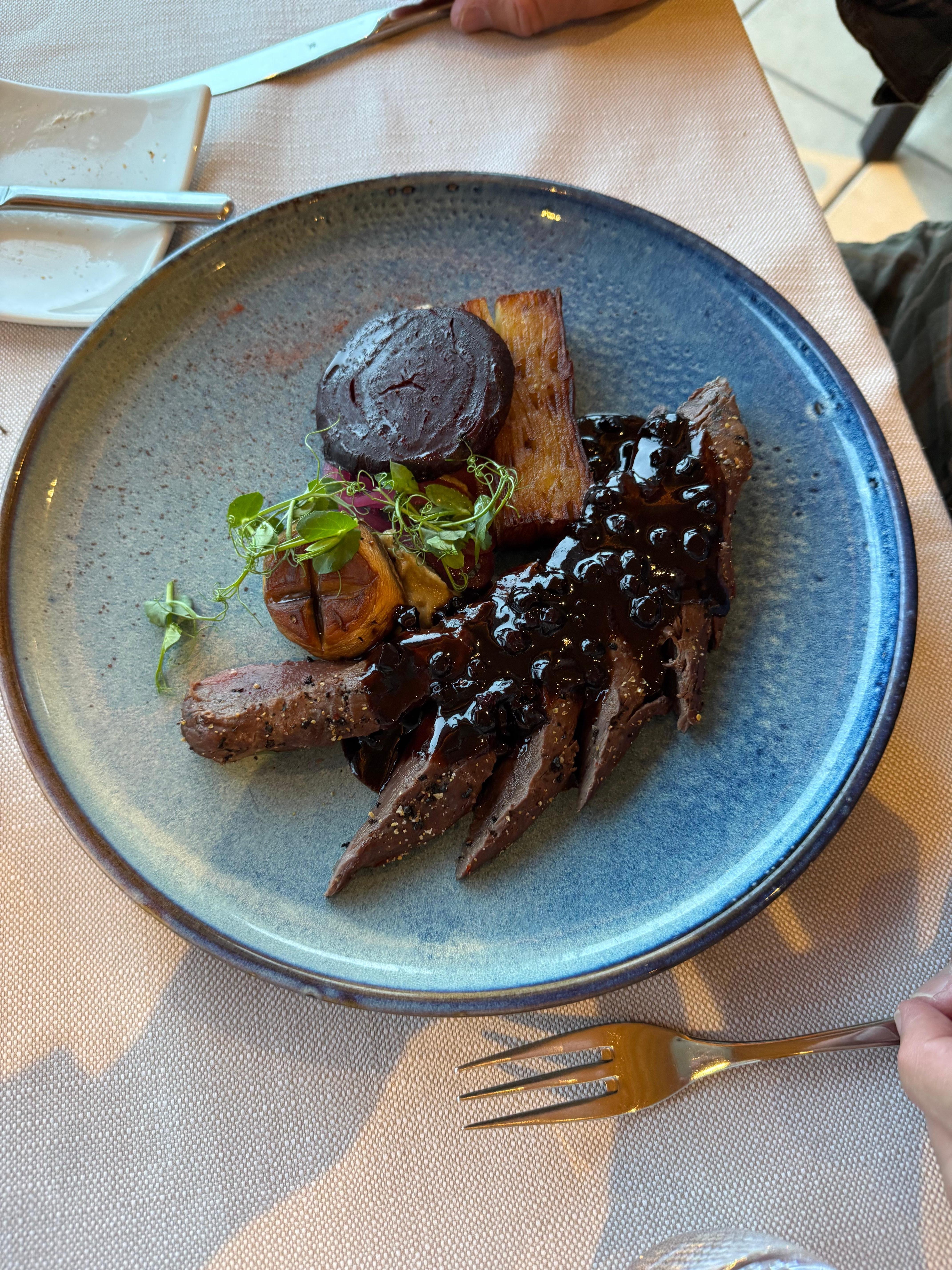 Reindeer, my husband said was tender and flavorful. 