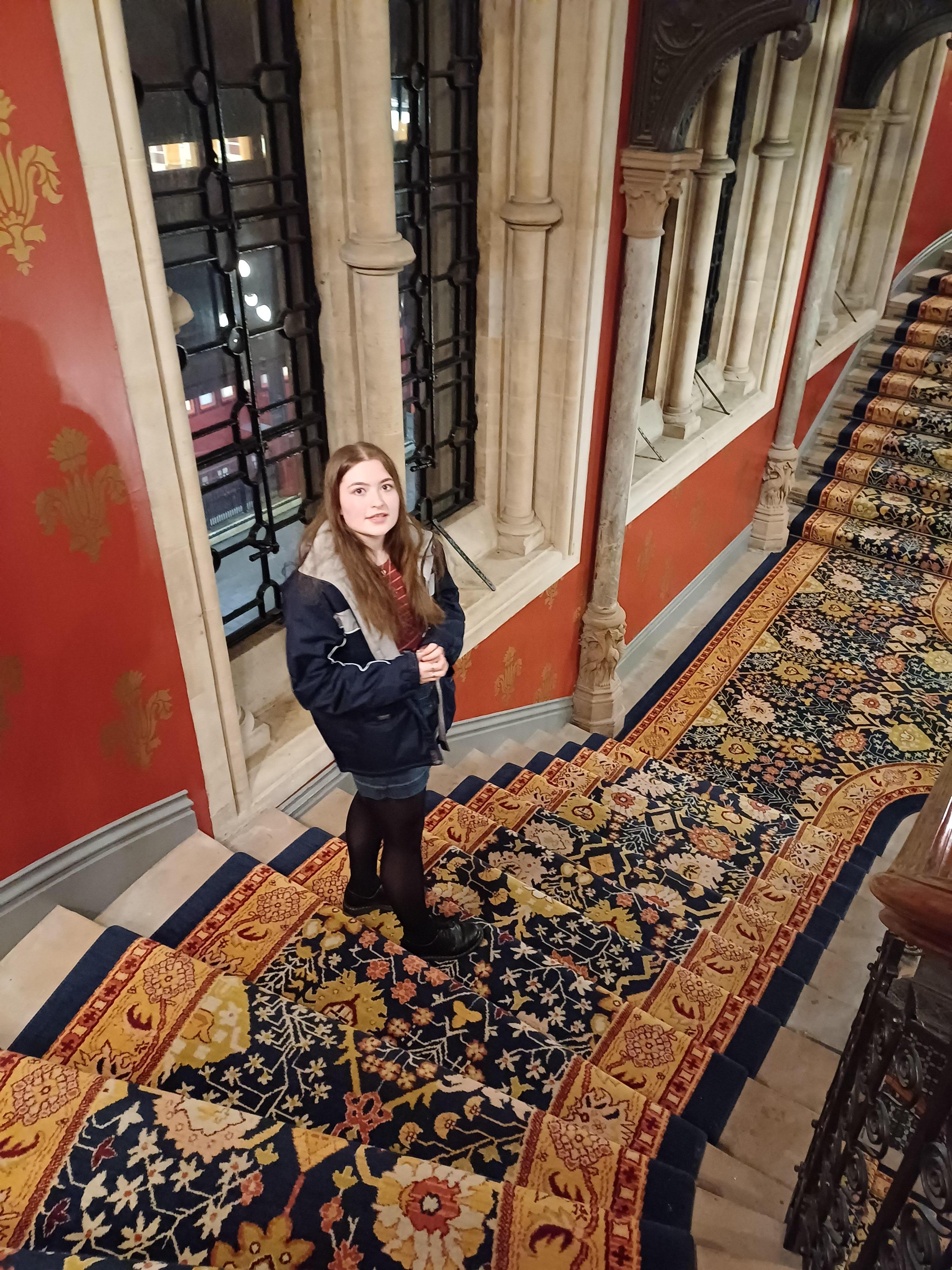 My daughter on the grand stairwell 