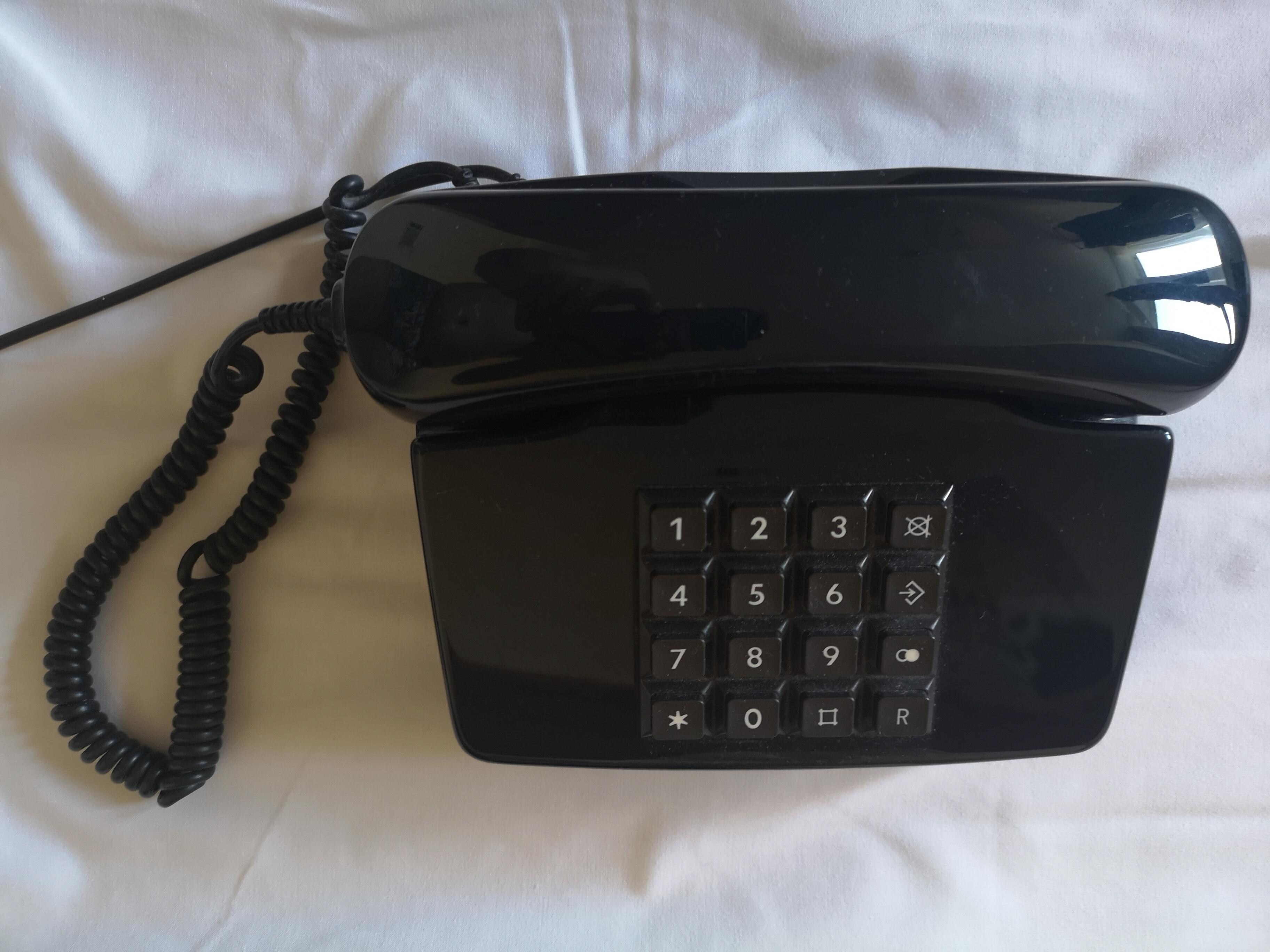 Iets om mee te telefoneren, met druktoetsen.