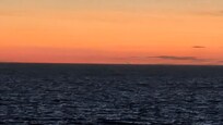 Sunset over the sea just at the end of the road from the Penrhyn.
