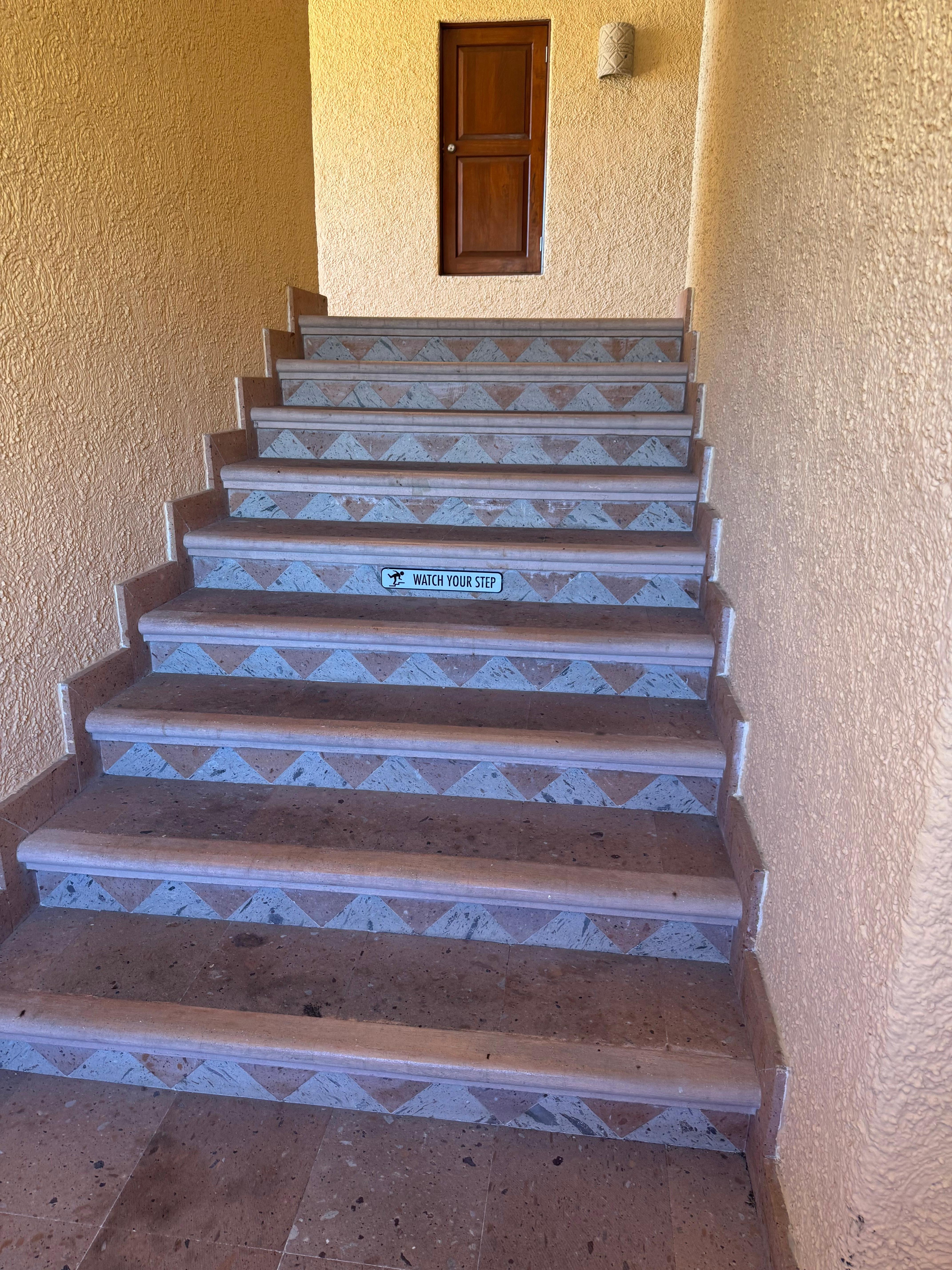 Illegal stairway with no handrails 