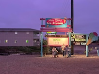 Ice cream next door with unit in the background.