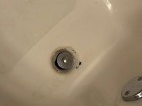 Drain in first bathroom