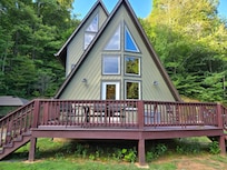 Front view of cabin sit in a comfy chair and take in the view