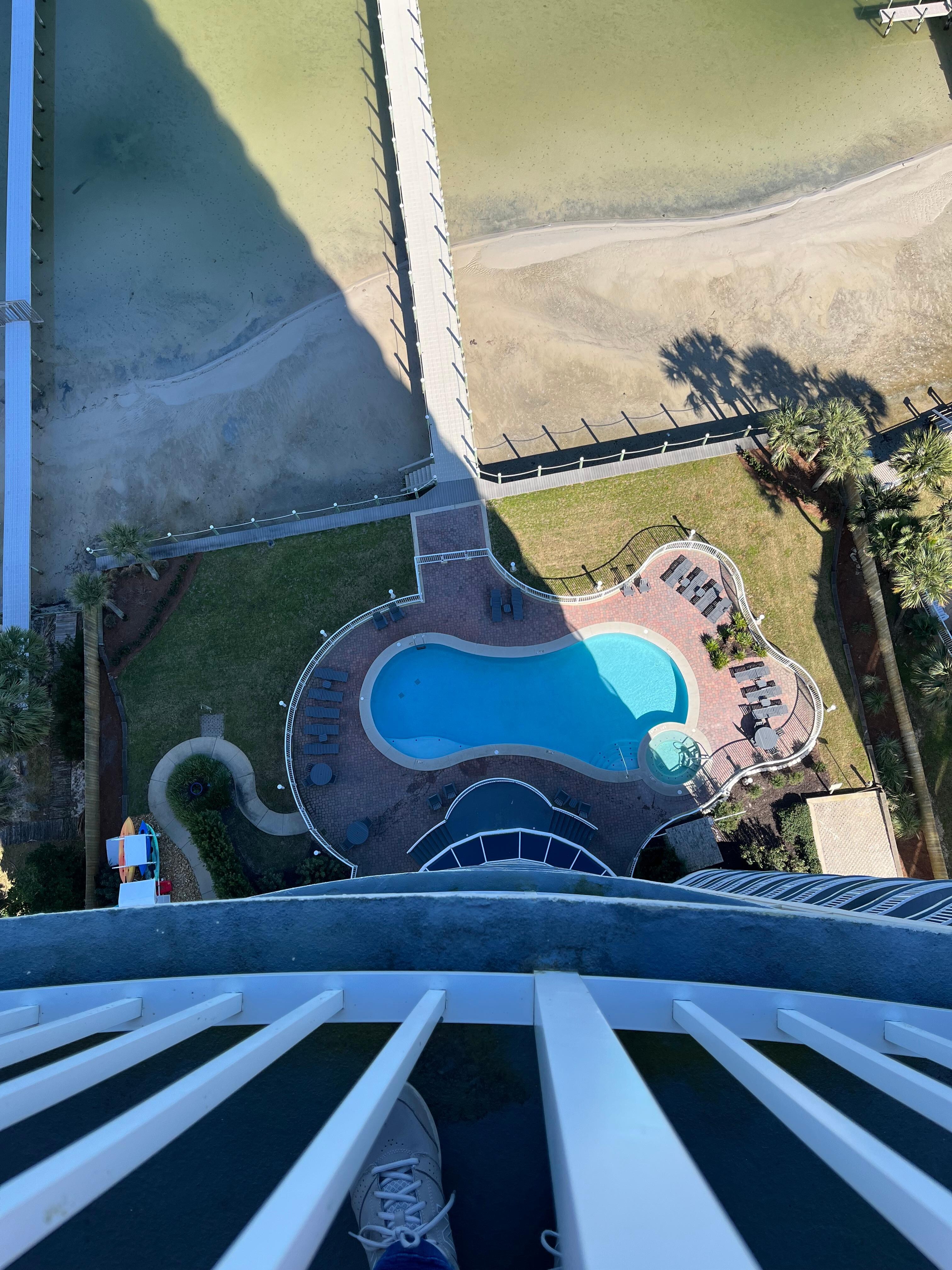 Looking down from balcony to outdoor pool