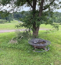 Fire pit without dry wood or chairs