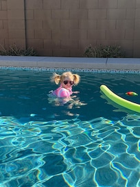 Lily, almost 2, loving swimming for the first time