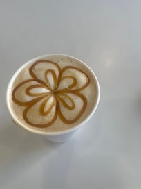 The Coffee Shop was a great find. So sorry I forgot her name but she made awesome lattes everyday!