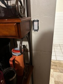 Outlets with no plates near the leaky broken coffee pot