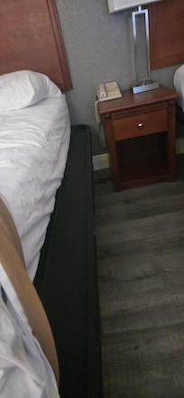 Full-size mattress on queen size frame. Bruise d and bashed knees getting in bed.