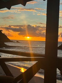 Sunset at Anse La Roche minutes away by boat to Boat