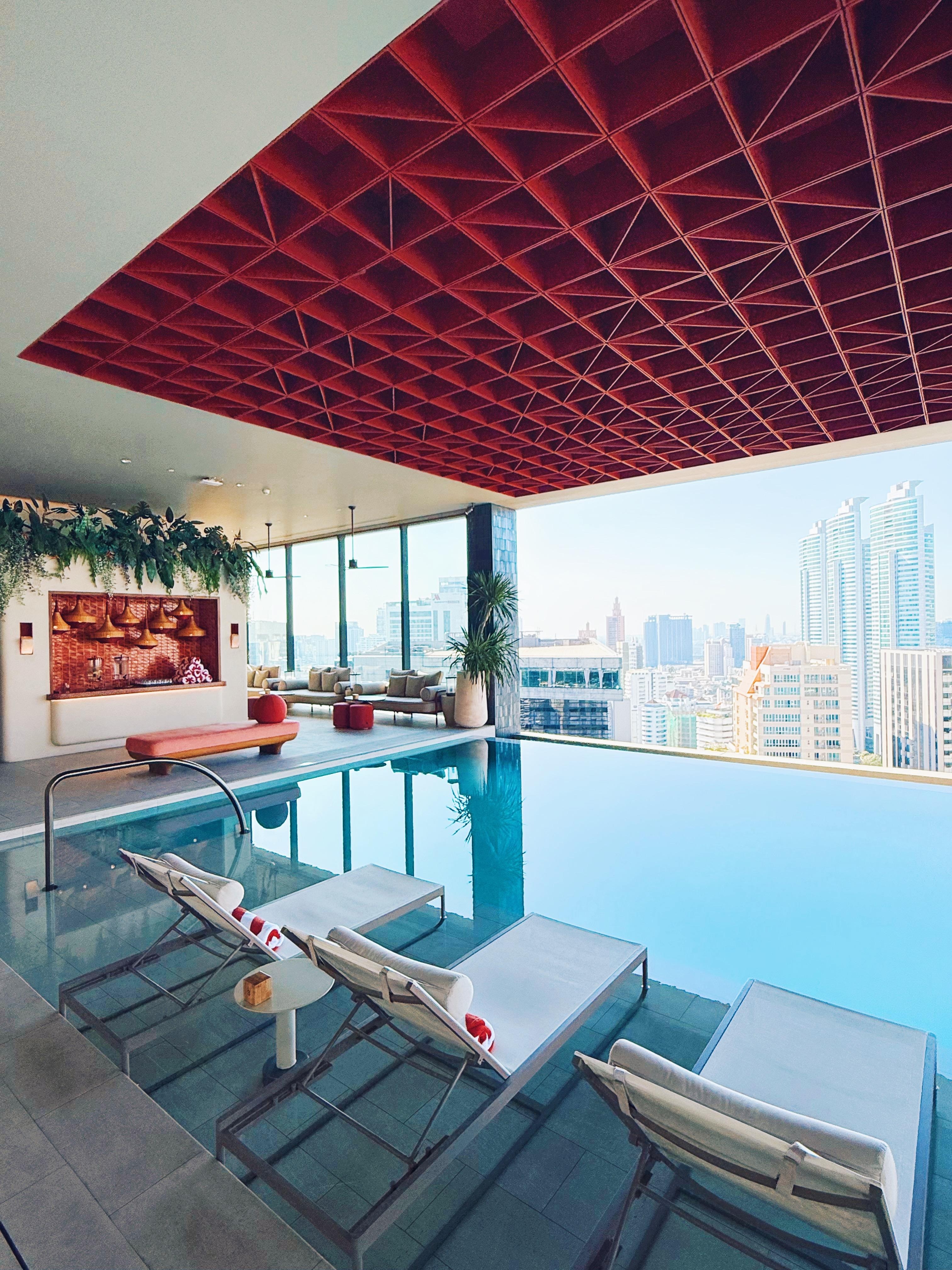 Hotel pool with a elevated view 